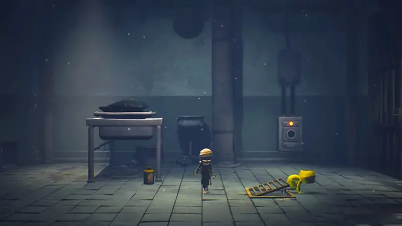A dimly lit room inside The Maw
